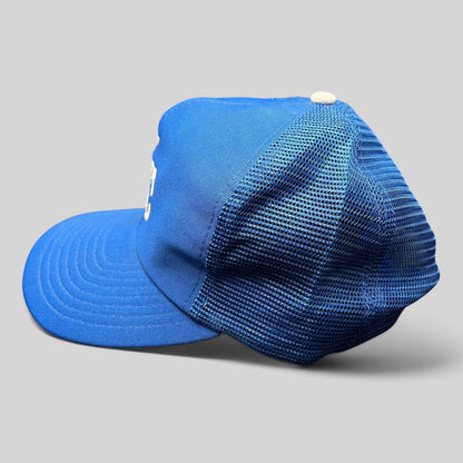 Raree Finds vintage Kansas City Royals trucker hat in royal blue with mesh back and foam front side profile view