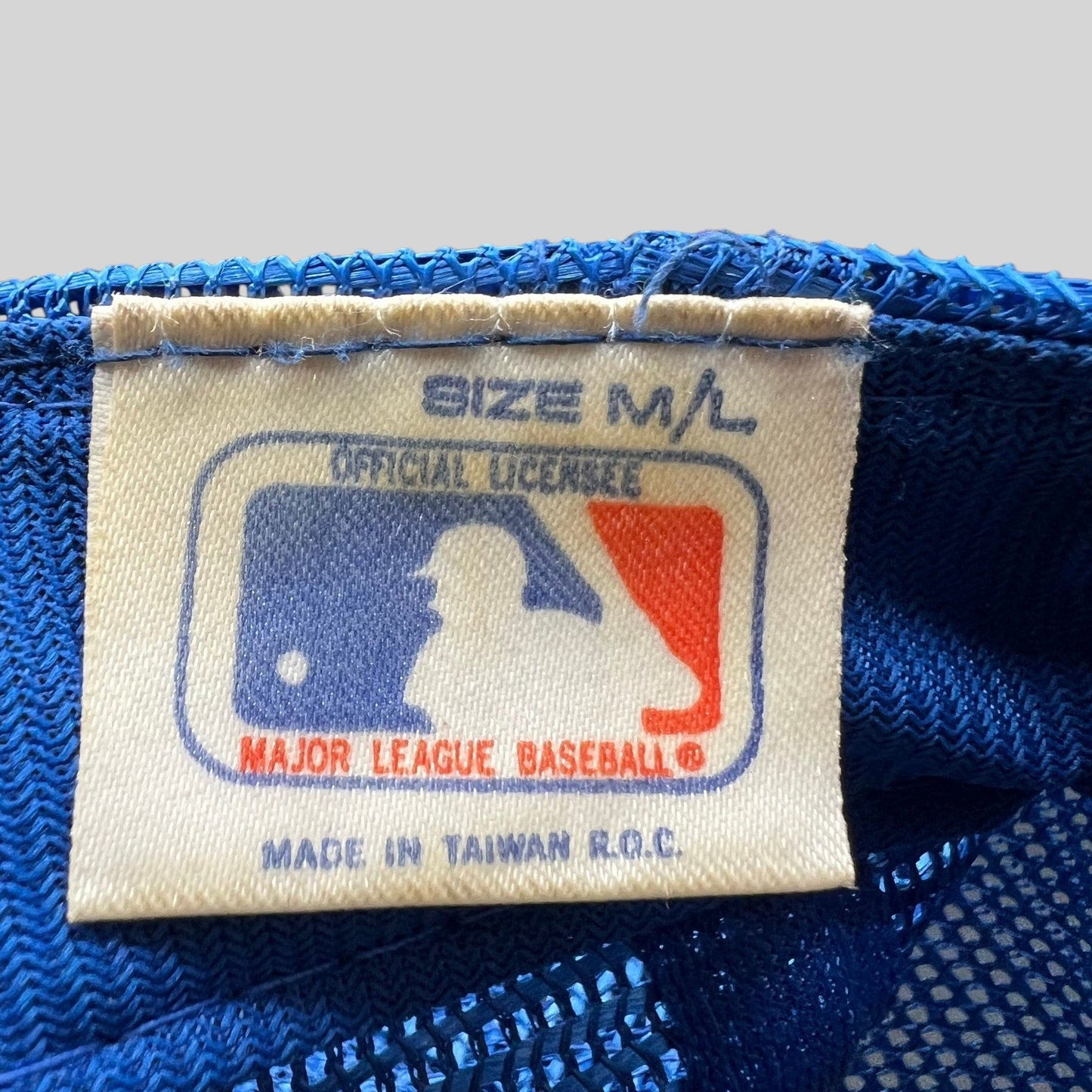 Raree Finds vintage Kansas City Royals hat interior tag showing MLB official licensee branding and made in Taiwan text