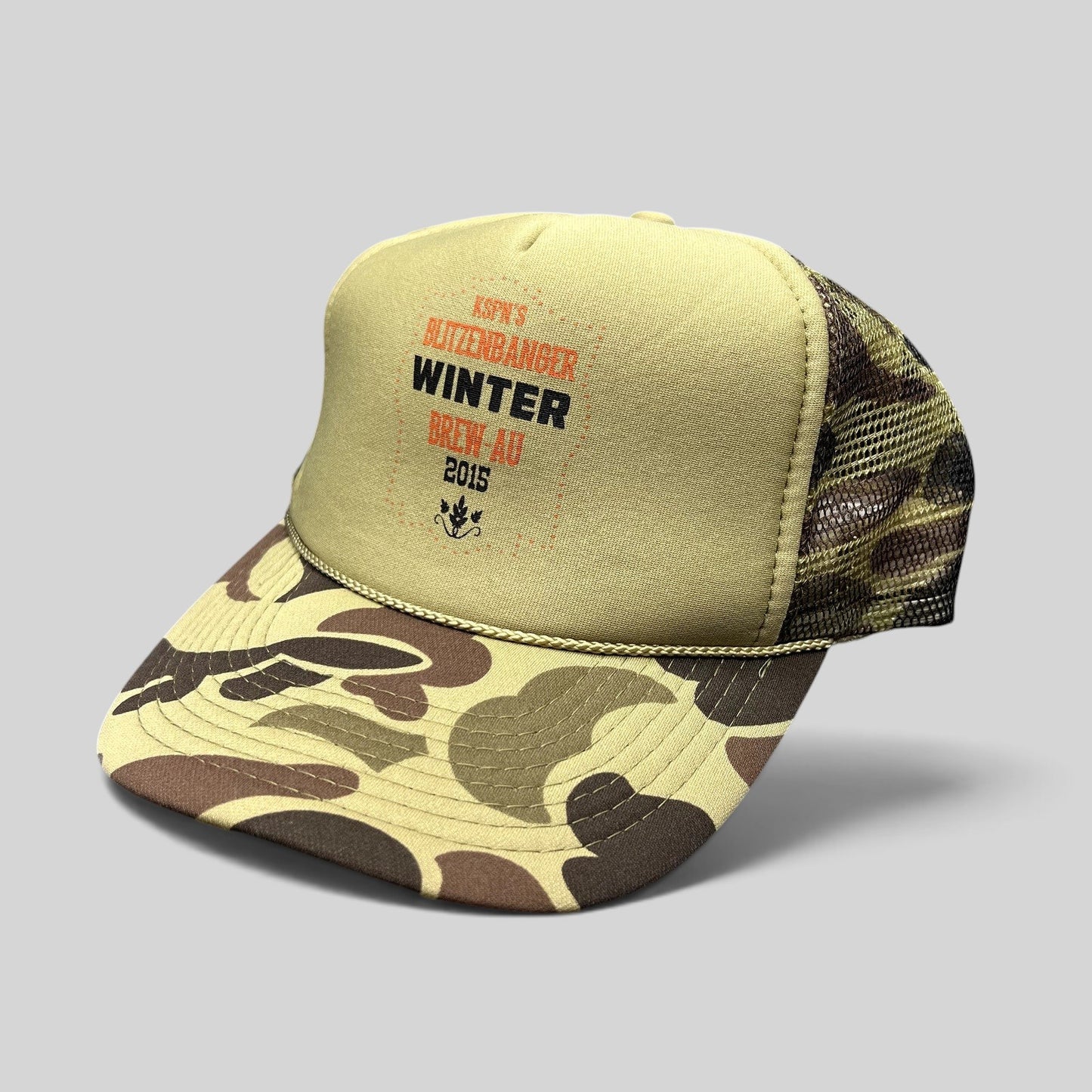 Raree Finds 2015 KSPN Blitzenbanger trucker hat with tan foam front, duck camo brim, and mesh back.
