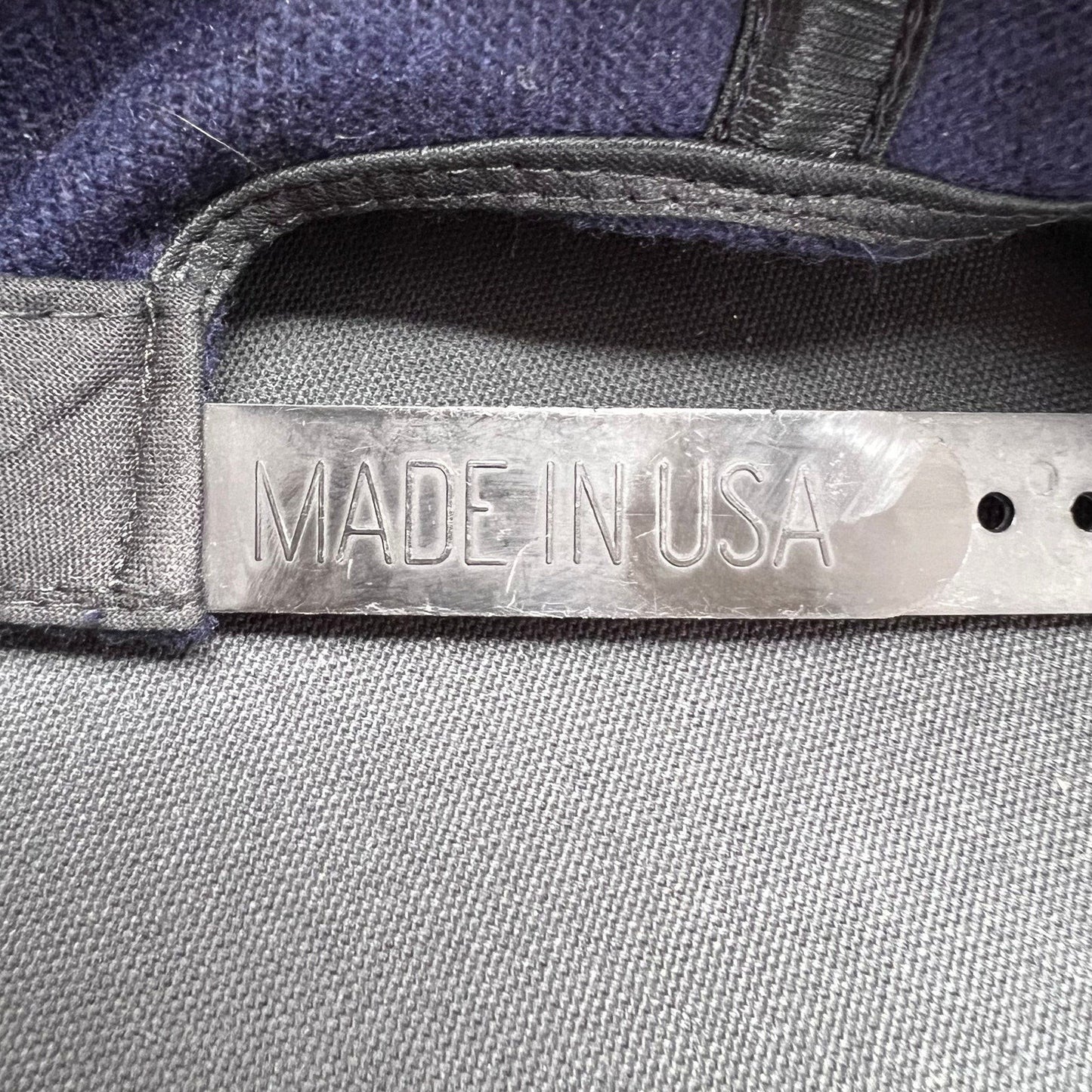 Raree Finds vintage 90s No Fear Gear snapback cap interior strap with Made in USA stamp on black adjustable closure