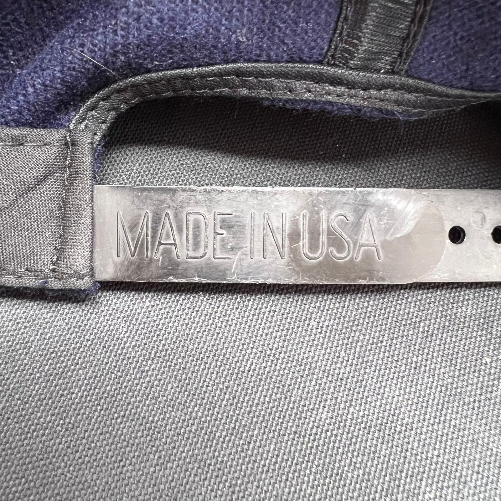 Raree Finds vintage 90s No Fear Gear snapback cap interior strap with Made in USA stamp on black adjustable closure