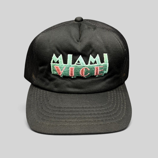 Raree Finds vintage 1980s Miami Vice black foam and mesh trucker hat with teal and pink embroidered logo