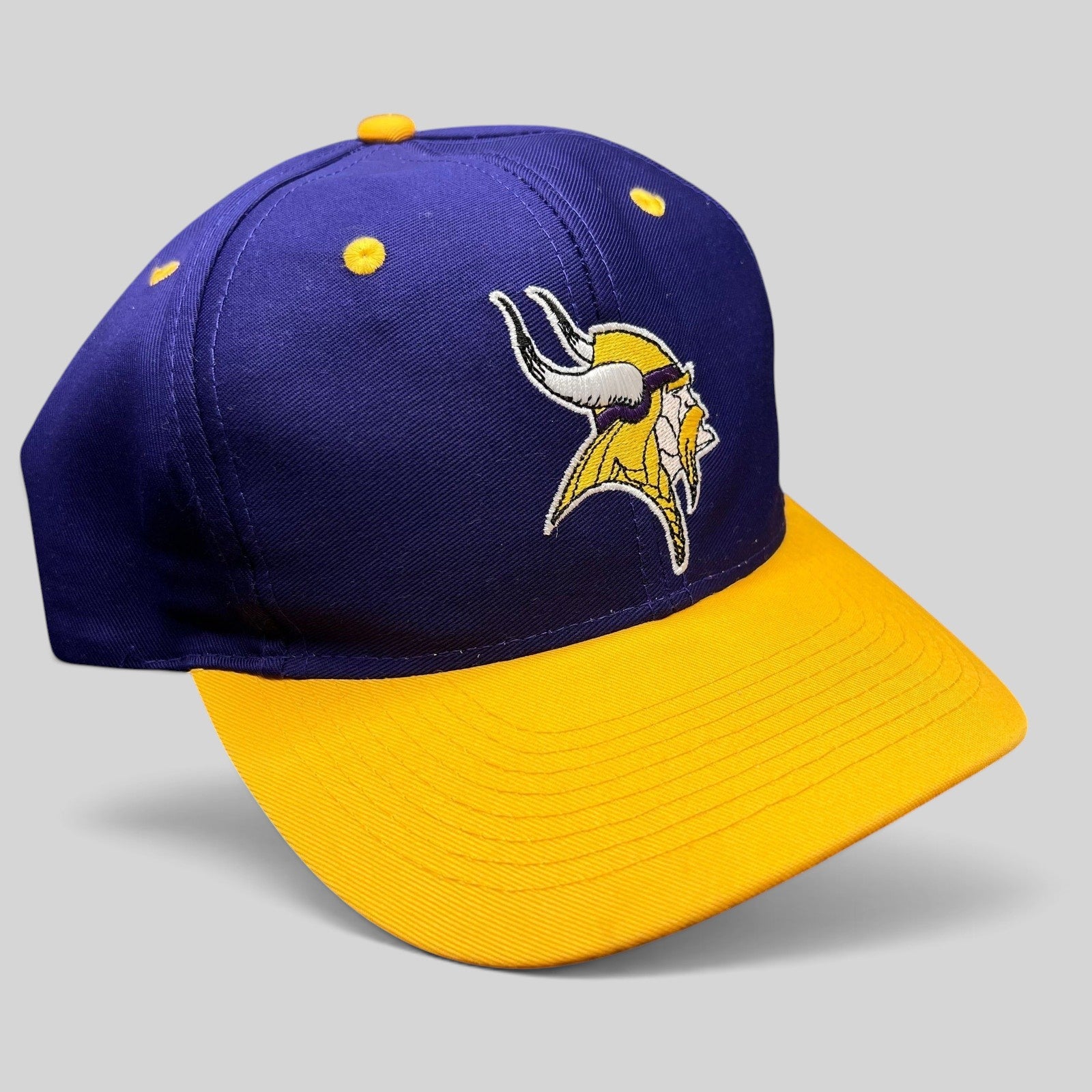 Raree Finds vintage Minnesota Vikings Logo Athletic snapback hat with purple crown and gold brim