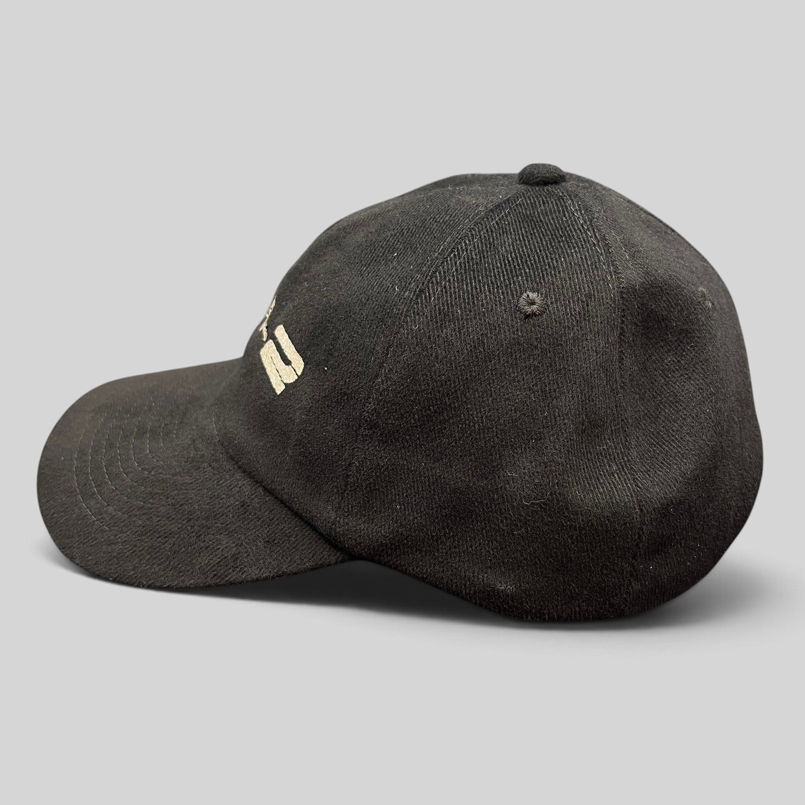 Raree Finds vintage black corduroy snapback hat with embroidered M:I-2 logo from the 2000 Mission Impossible 2 film.