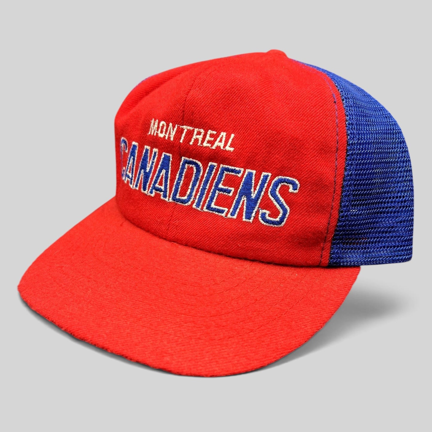 Raree Finds vintage Montreal Canadiens NHL mesh trucker snapback hat in red and blue with embroidered front script.