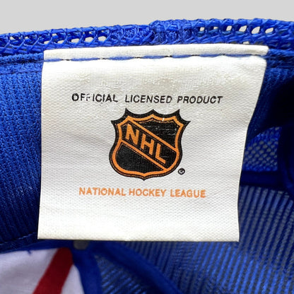 Raree Finds vintage Montreal Canadiens NHL official licensed product tag on a blue mesh trucker hat