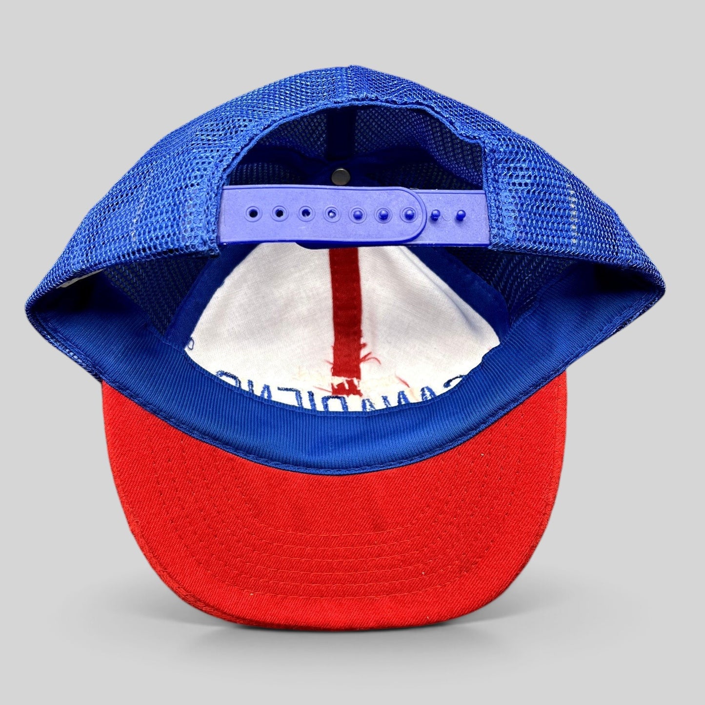 Raree Finds vintage Montreal Canadiens NHL mesh trucker snapback hat with blue adjustable snap closure and red brim.