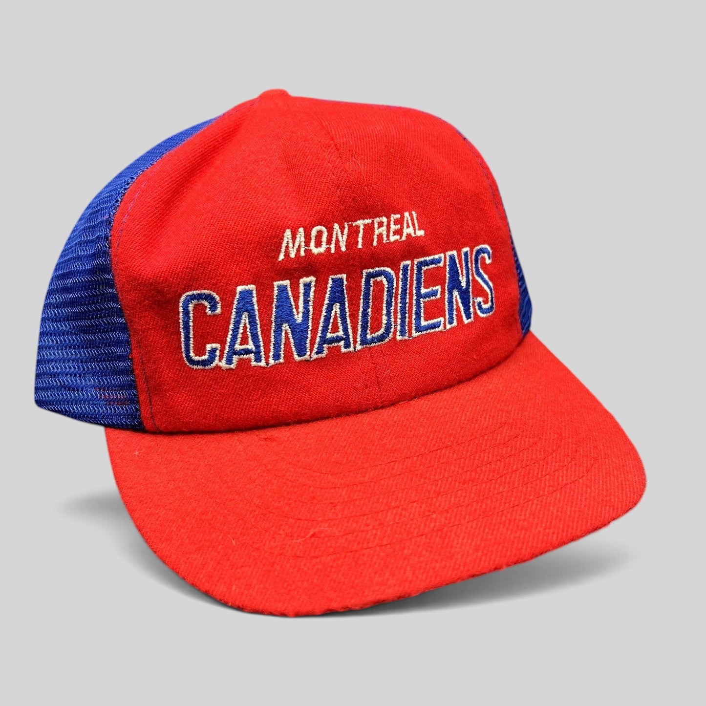 Raree Finds vintage Montreal Canadiens NHL mesh trucker snapback hat in red and blue with embroidered script logo.
