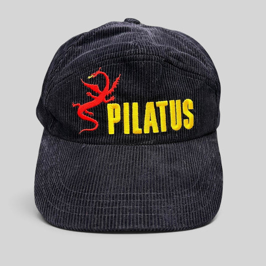 Raree Finds vintage navy corduroy strapback hat with red dragon graphic and yellow Pilatus embroidery