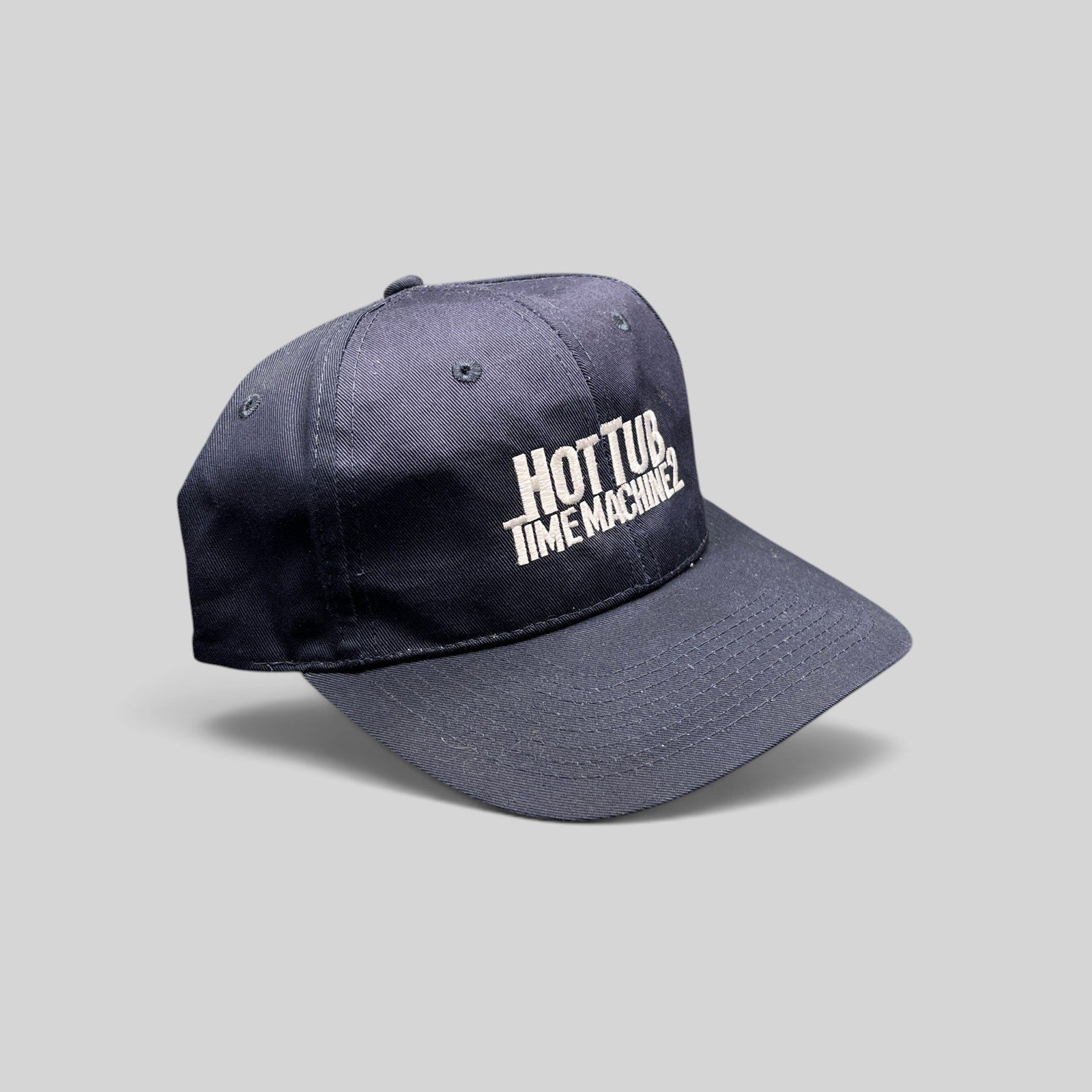 Raree Finds navy blue Hot Tub Time Machine 2 promotional movie cap with white embroidered logo and Velcro strapback