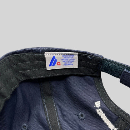 Raree Finds navy cotton-poly blend cap interior showing Sportsman brand tag and adjustable velcro strap
