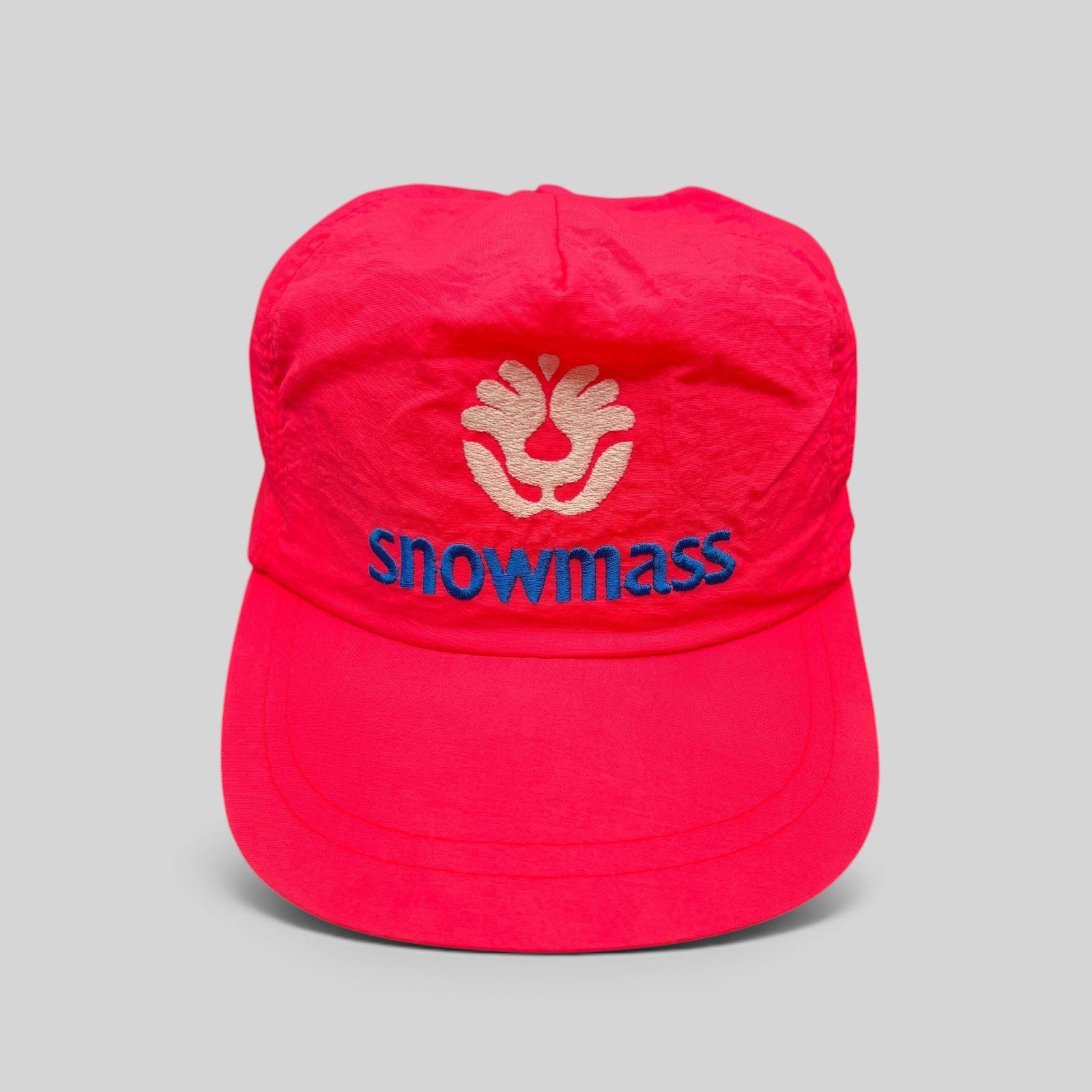 Raree Finds vintage 80s neon pink nylon Snowmass ski hat with white tree logo and blue embroidery