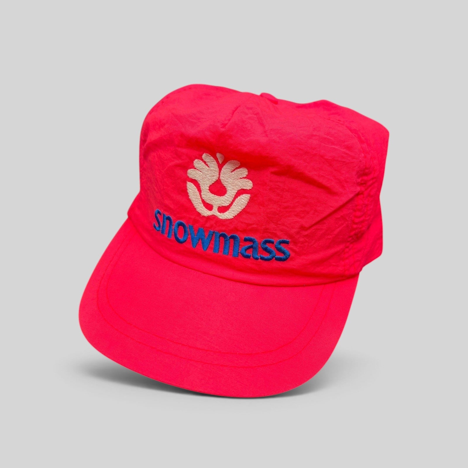 Raree Finds vintage 80s neon pink nylon Snowmass ski hat with white tree logo and blue embroidery