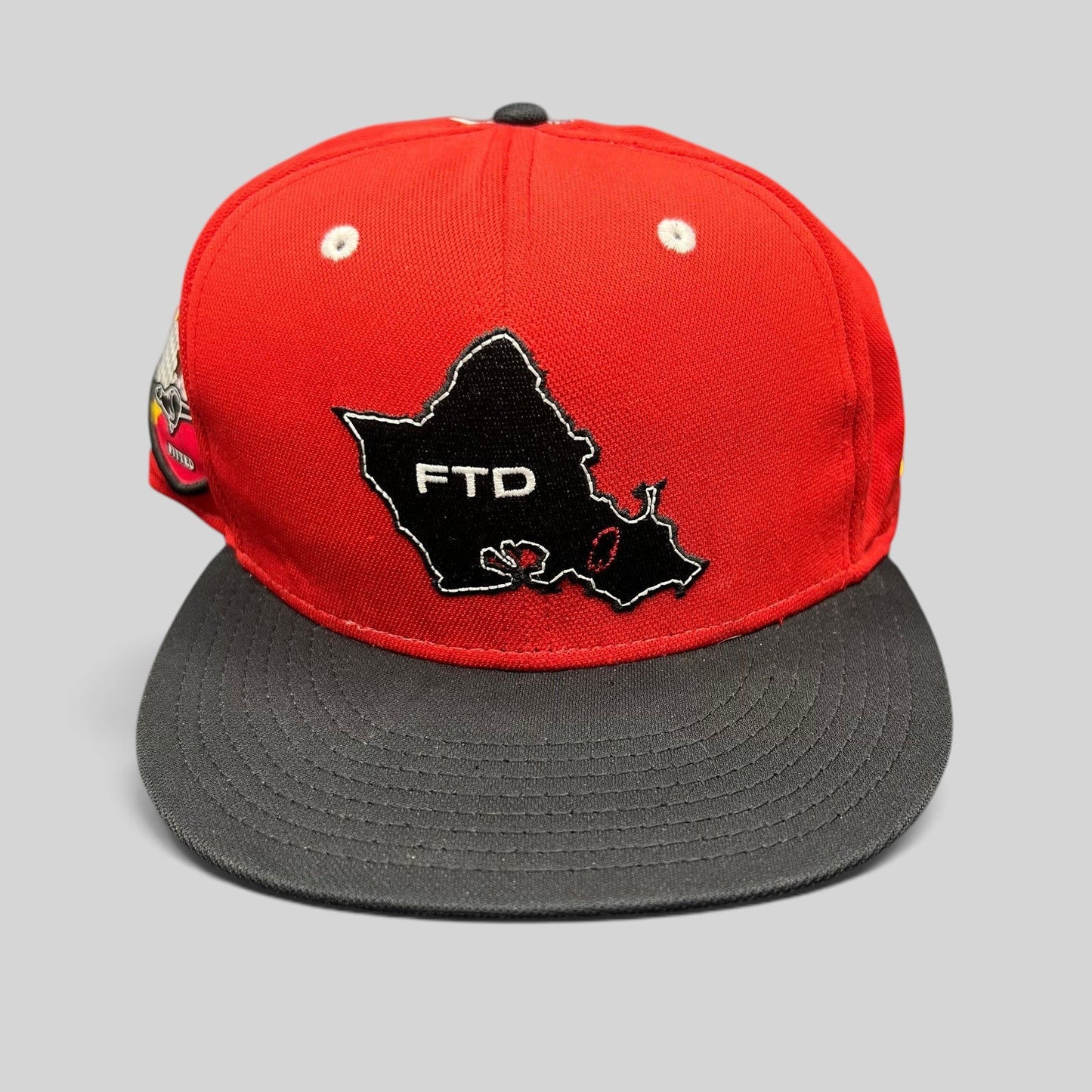 Raree Finds New Era Hawaii King of Tantalus snapback hat in red and black with FTD map embroidery and side patch.