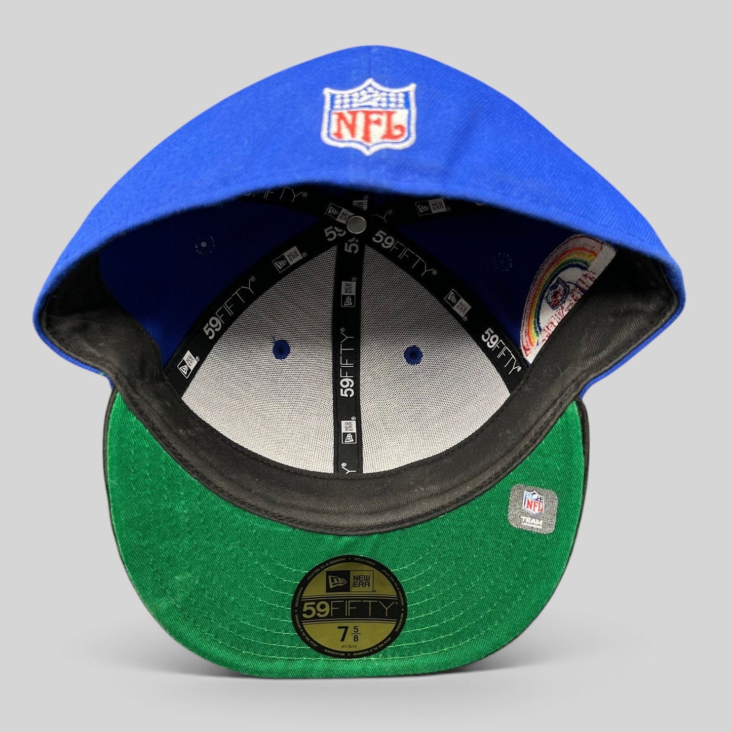 Raree Finds New Era 59FIFTY New England Patriots fitted hat interior showing green undervisor and branding details