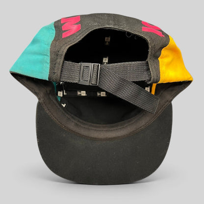 Raree Finds New Era Ice Cream America strapback hat with black, teal, and yellow panels and adjustable nylon strap.
