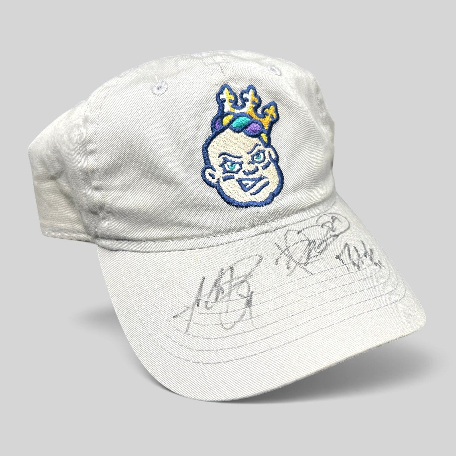 Raree Finds New Orleans Baby Cakes cream cotton strapback dad hat with team logo and player autographs on the brim