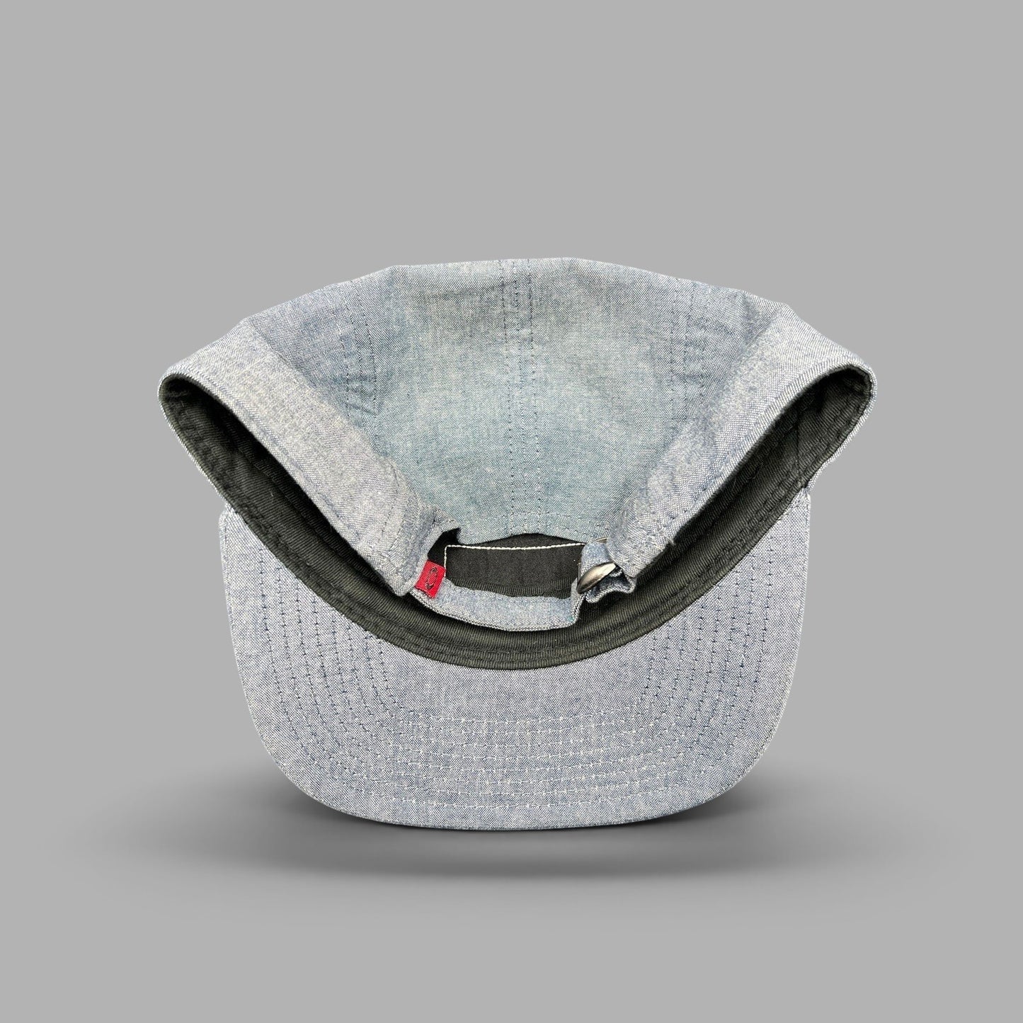 Raree Finds Oakley light denim chambray 5-panel camp cap interior view with adjustable metal buckle strap