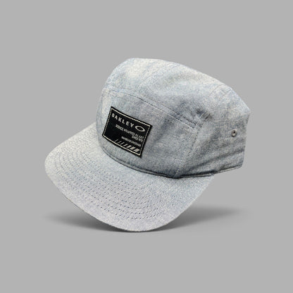 Raree Finds Oakley light denim chambray 5-panel camp cap with black Science Wrapped in Art patch and metal buckle