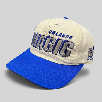 Raree Finds vintage Sports Specialties Orlando Magic snapback hat with white crown, royal blue brim, and shadow logo.
