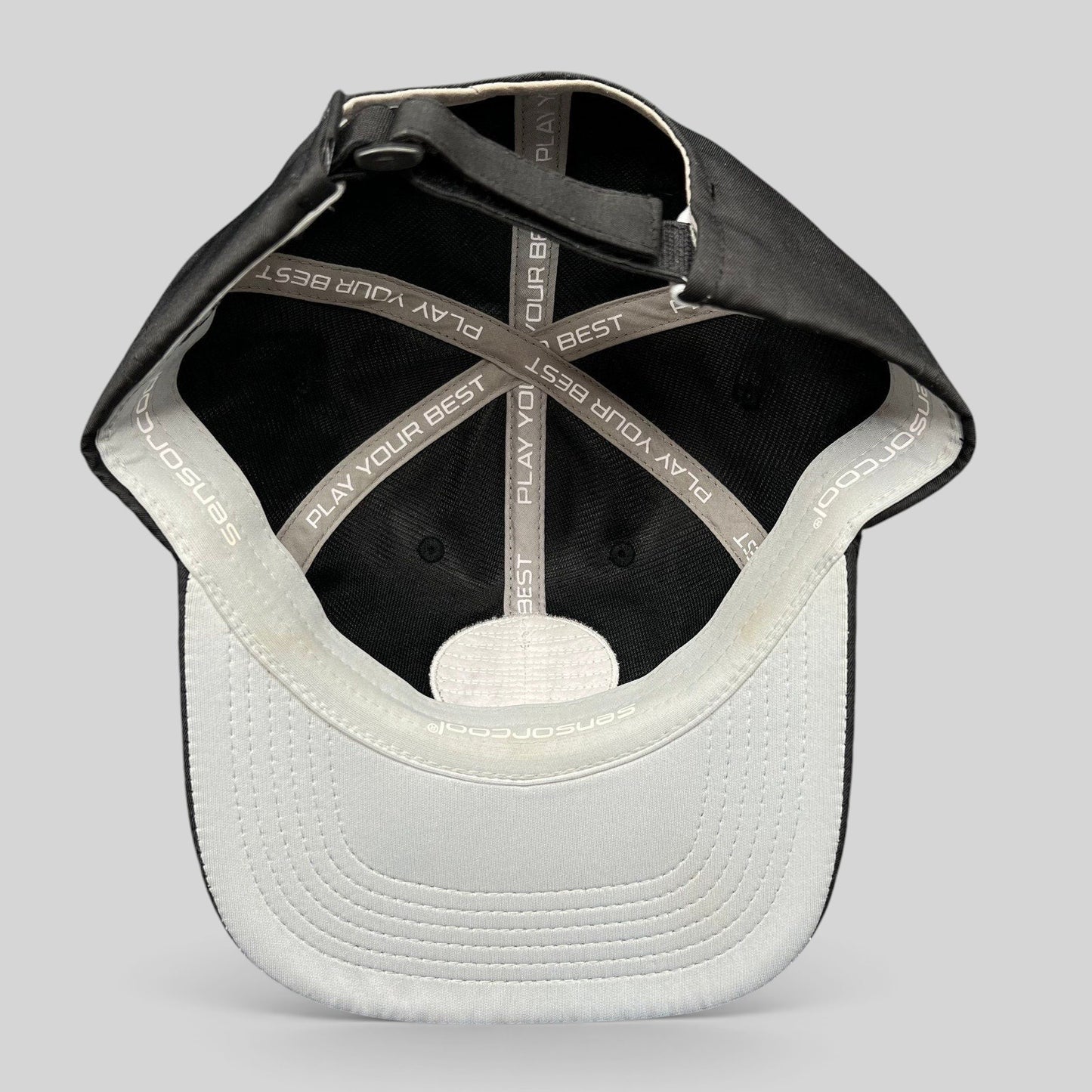 Raree Finds PING golf hat interior showing SensorCool moisture-wicking lining and Play Your Best branded tape