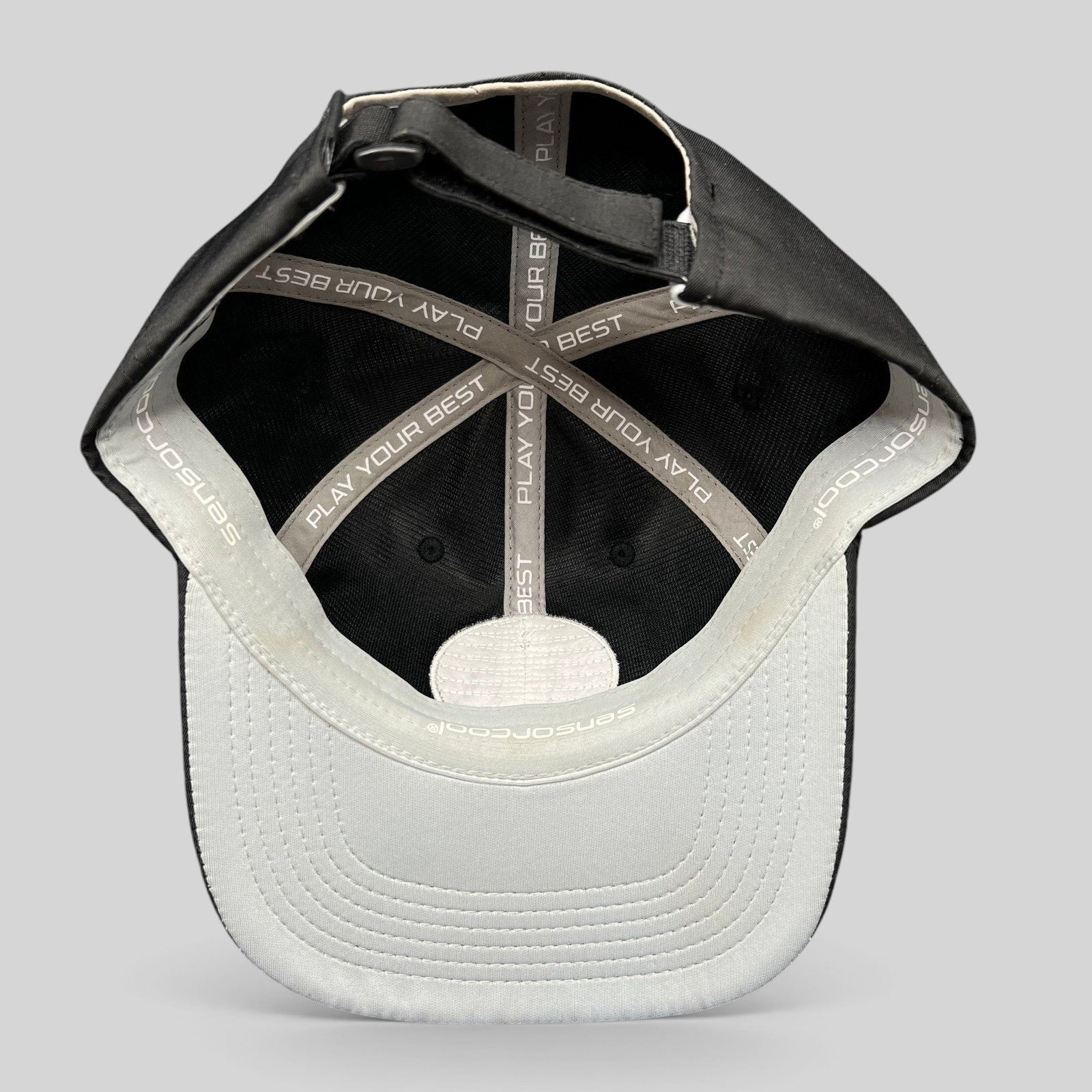 Raree Finds PING golf hat interior showing SensorCool moisture-wicking lining and Play Your Best branded tape