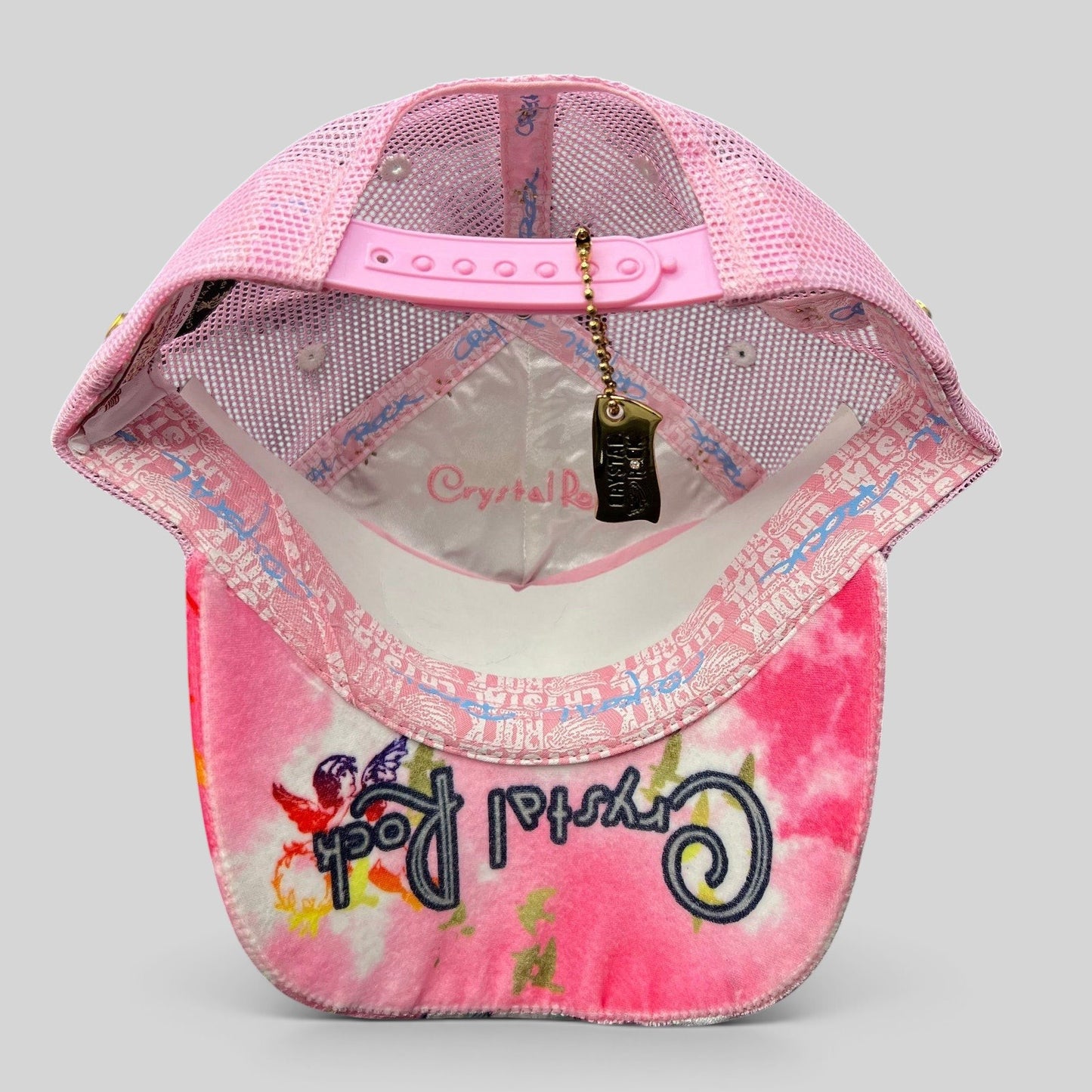 Raree Finds Crystal Rock by Christian Audigier pink Y2K trucker hat with interior branding and snapback closure