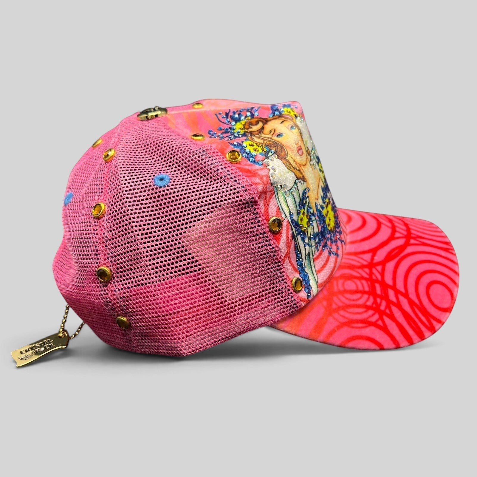 Raree Finds Crystal Rock by Christian Audigier pink trucker hat with Y2K graphic, rhinestones, and metallic studs.