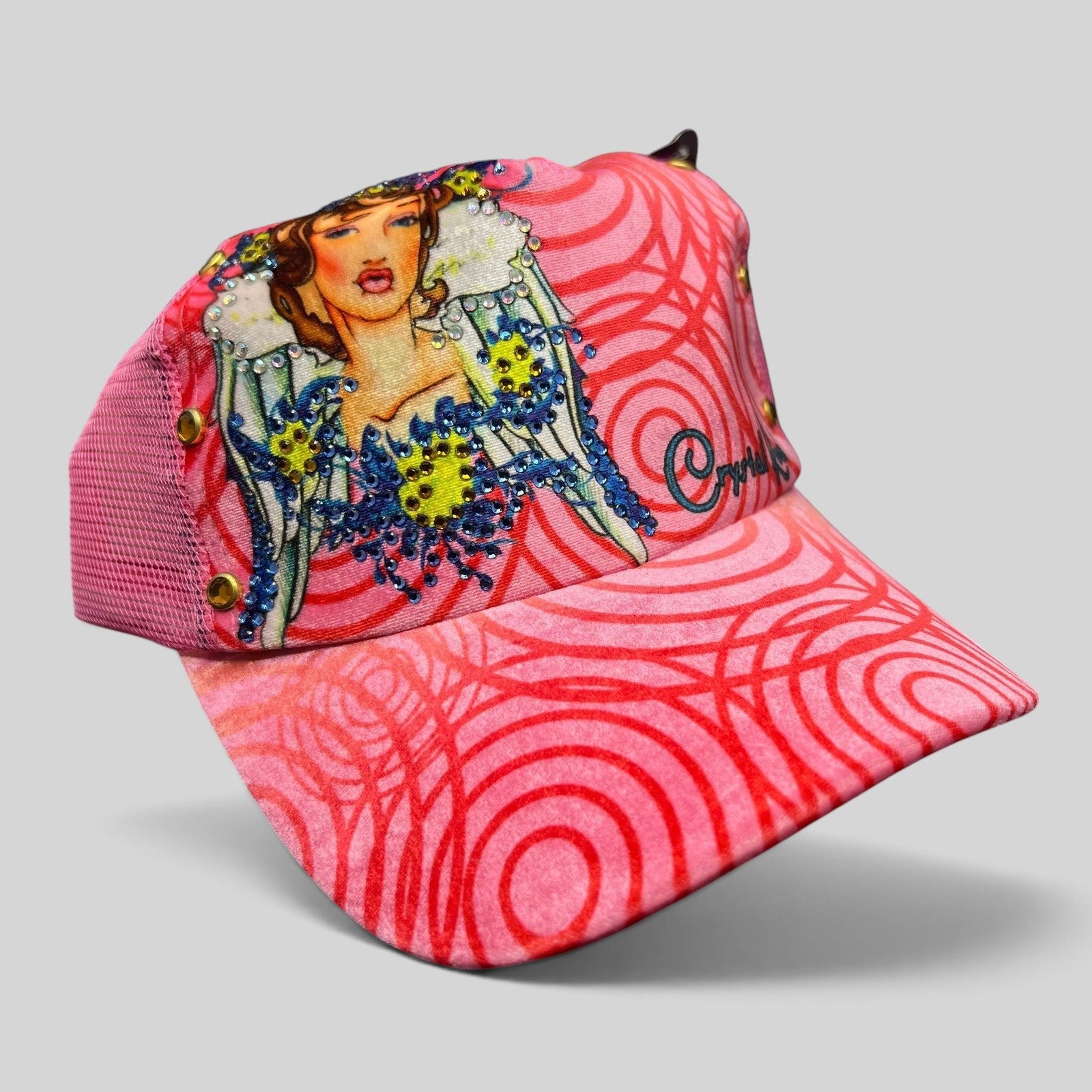 Raree Finds pink Crystal Rock by Christian Audigier trucker hat with Y2K graphic, rhinestones, and stud accents.