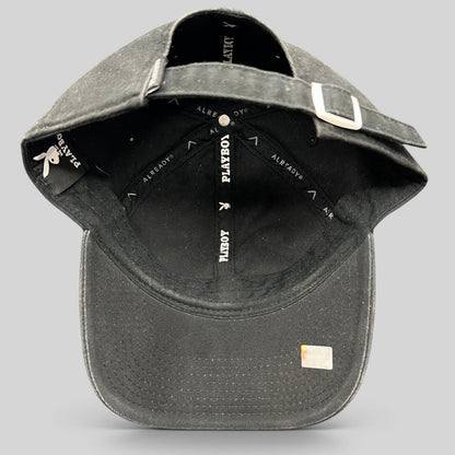 Raree Finds black Playboy strapback hat with interior Already Design Co branding and adjustable metal clasp closure