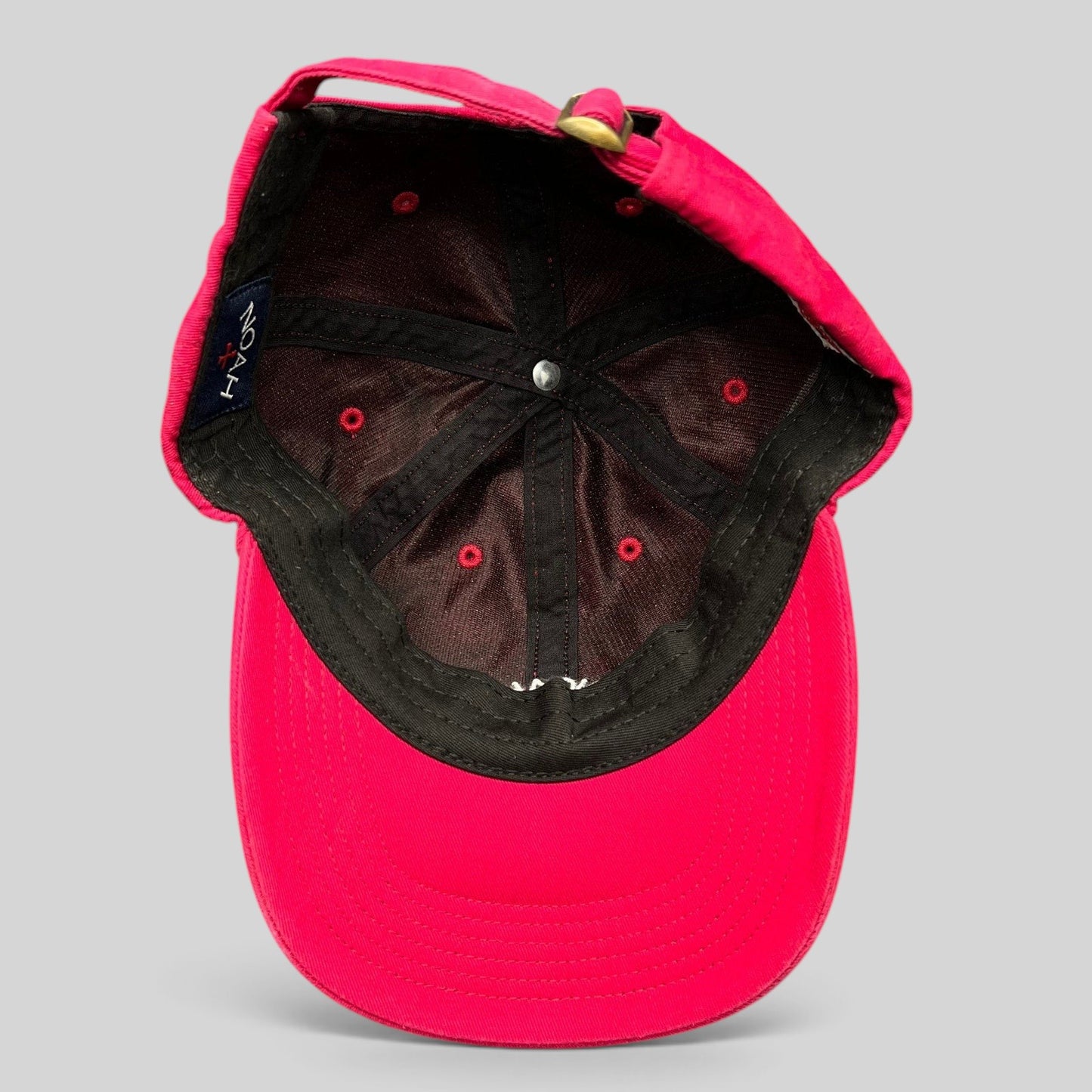 Raree Finds red cotton strapback hat with interior NOAH brand label and unstructured design