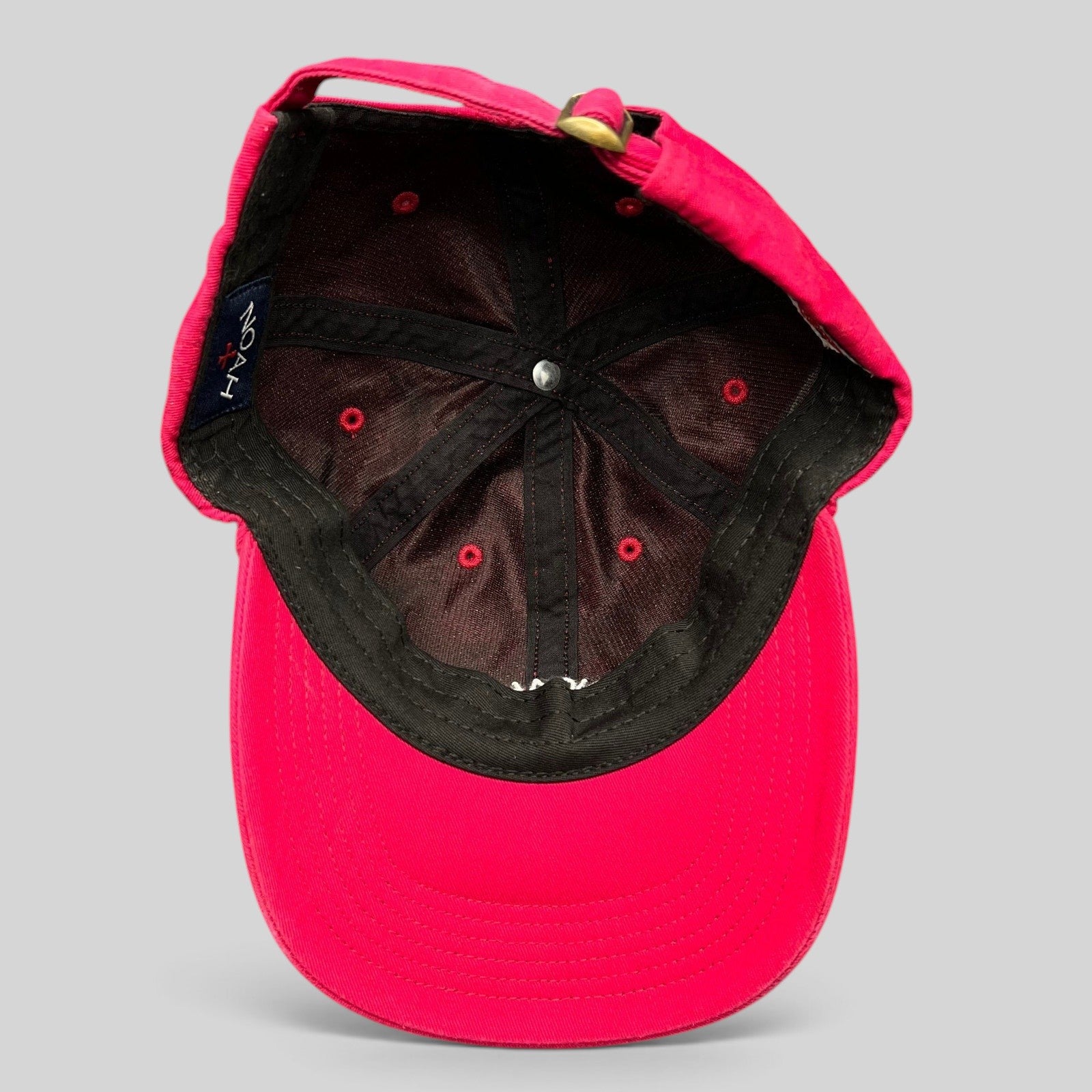 Raree Finds red cotton strapback hat with interior NOAH brand label and unstructured design