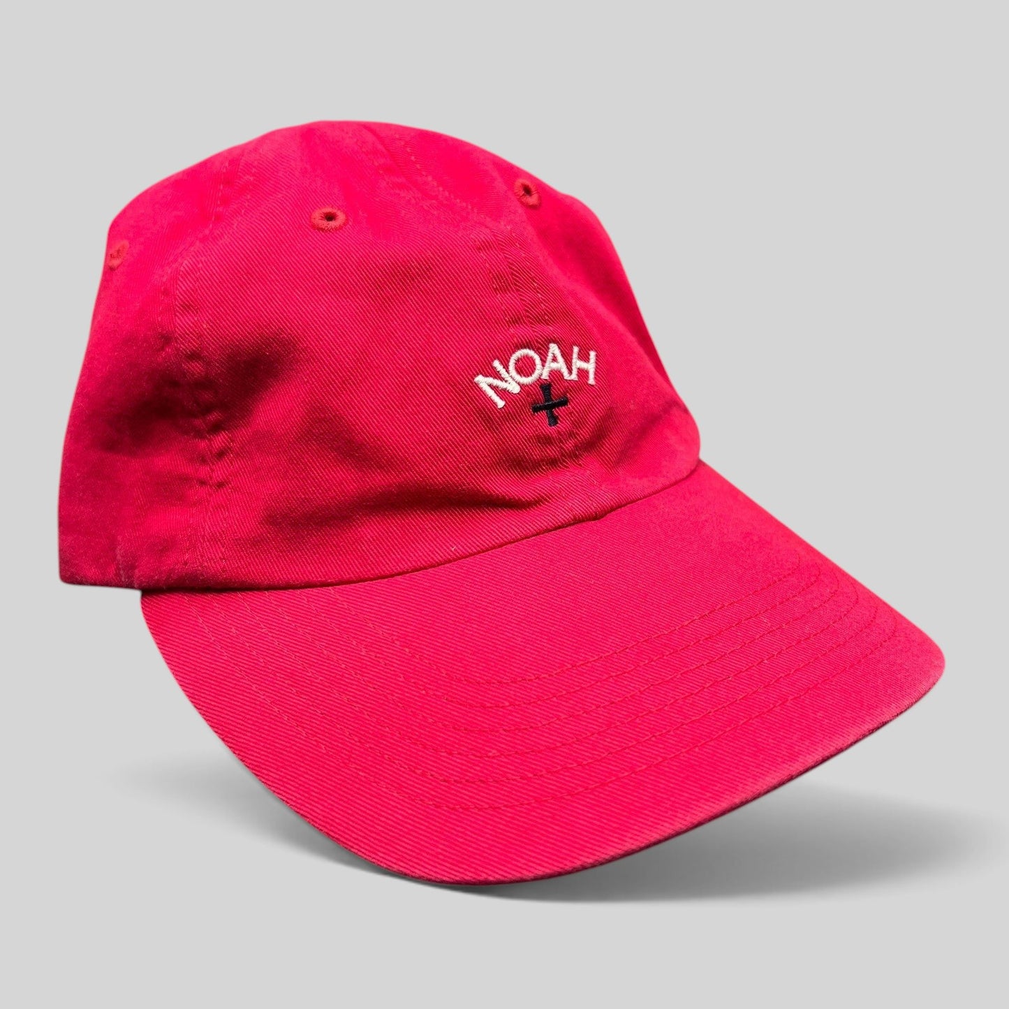 Raree Finds red cotton unstructured strapback hat with white embroidered NOAH cross logo