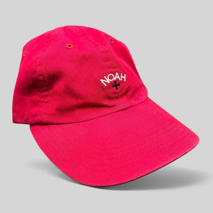 Raree Finds red cotton unstructured strapback hat with white embroidered NOAH cross logo