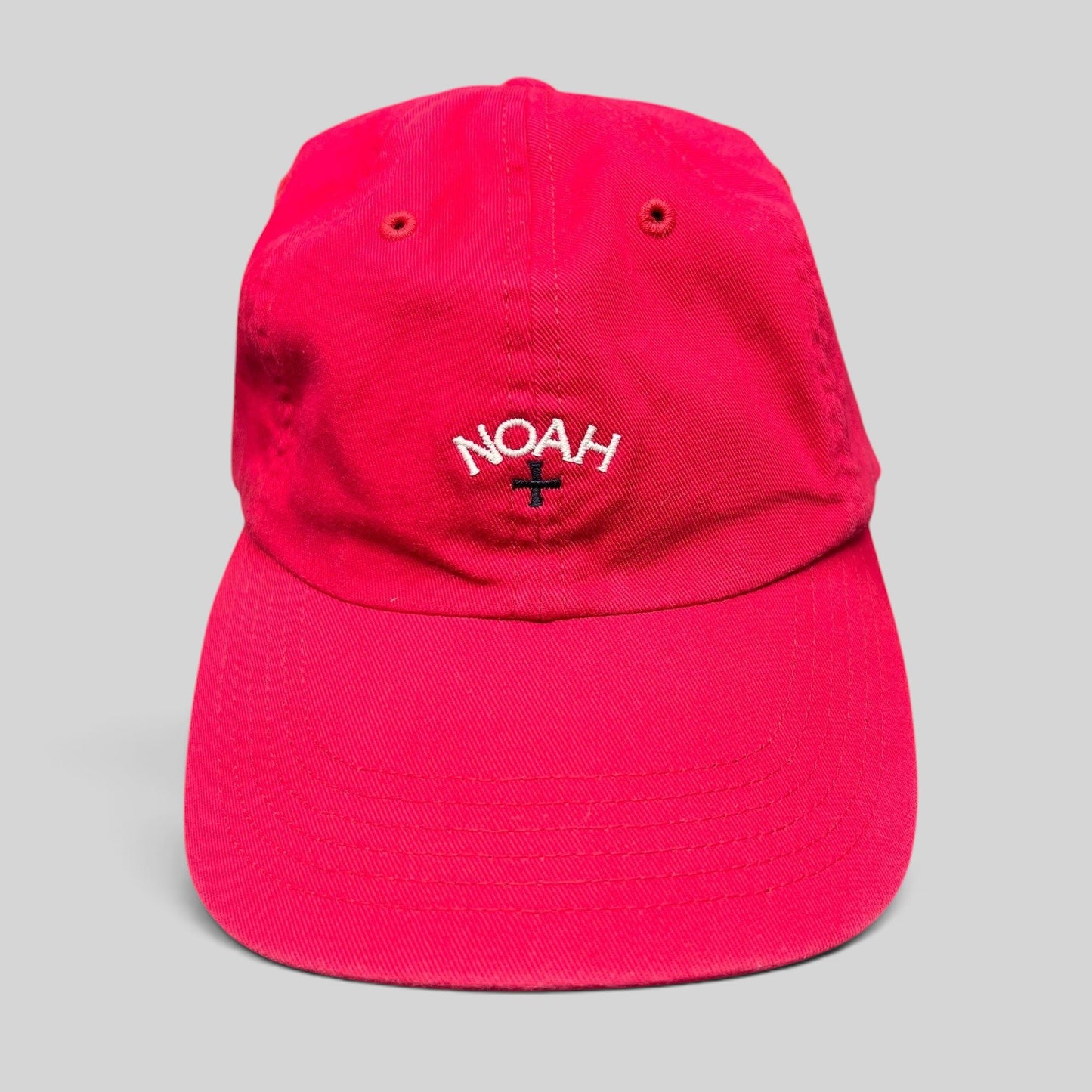 Raree Finds red cotton strapback hat with white embroidered NOAH cross logo and unstructured profile