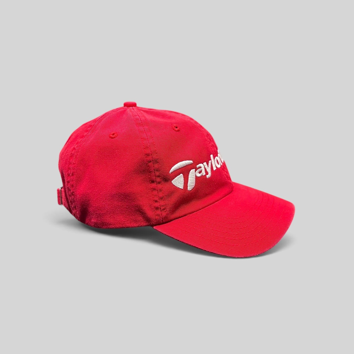 Raree Finds red cotton TaylorMade golf hat with white logo embroidery and curved brim in an unstructured style.