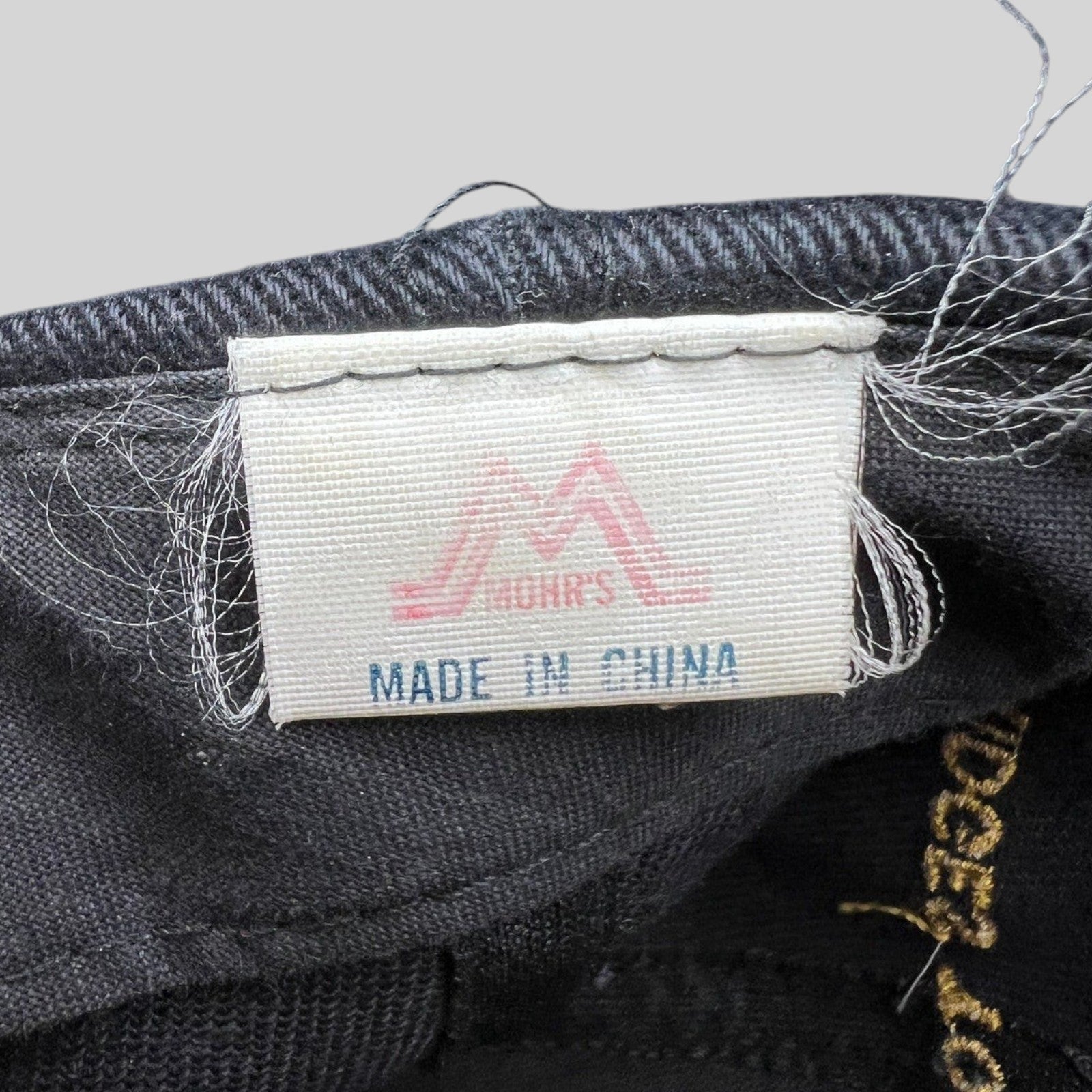 Raree Finds vintage 1997 Rolling Stones tour hat interior label by Mohr's showing Made in China tag