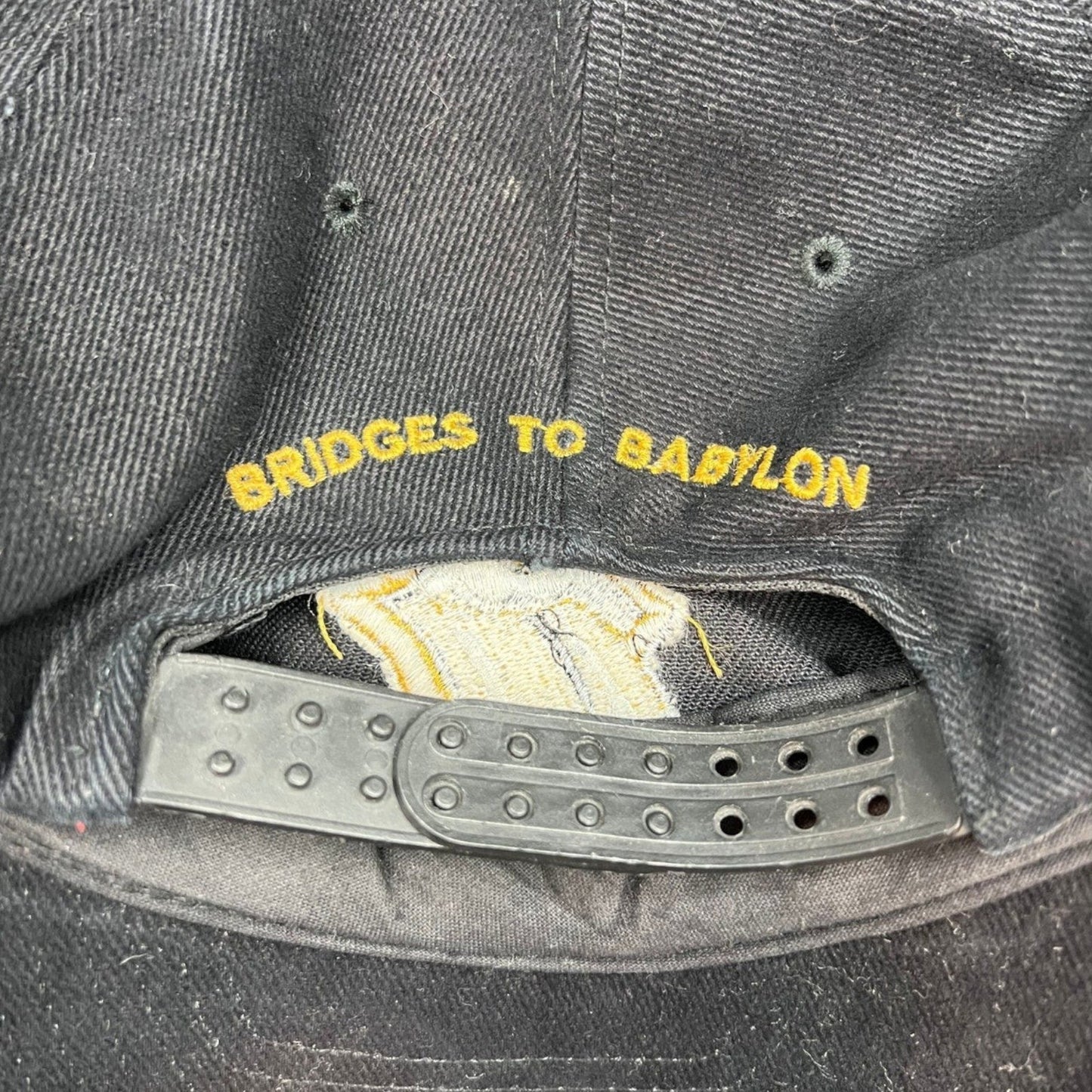 Raree Finds vintage 1997 Rolling Stones Bridges to Babylon black cotton snapback hat with gold embroidered back text