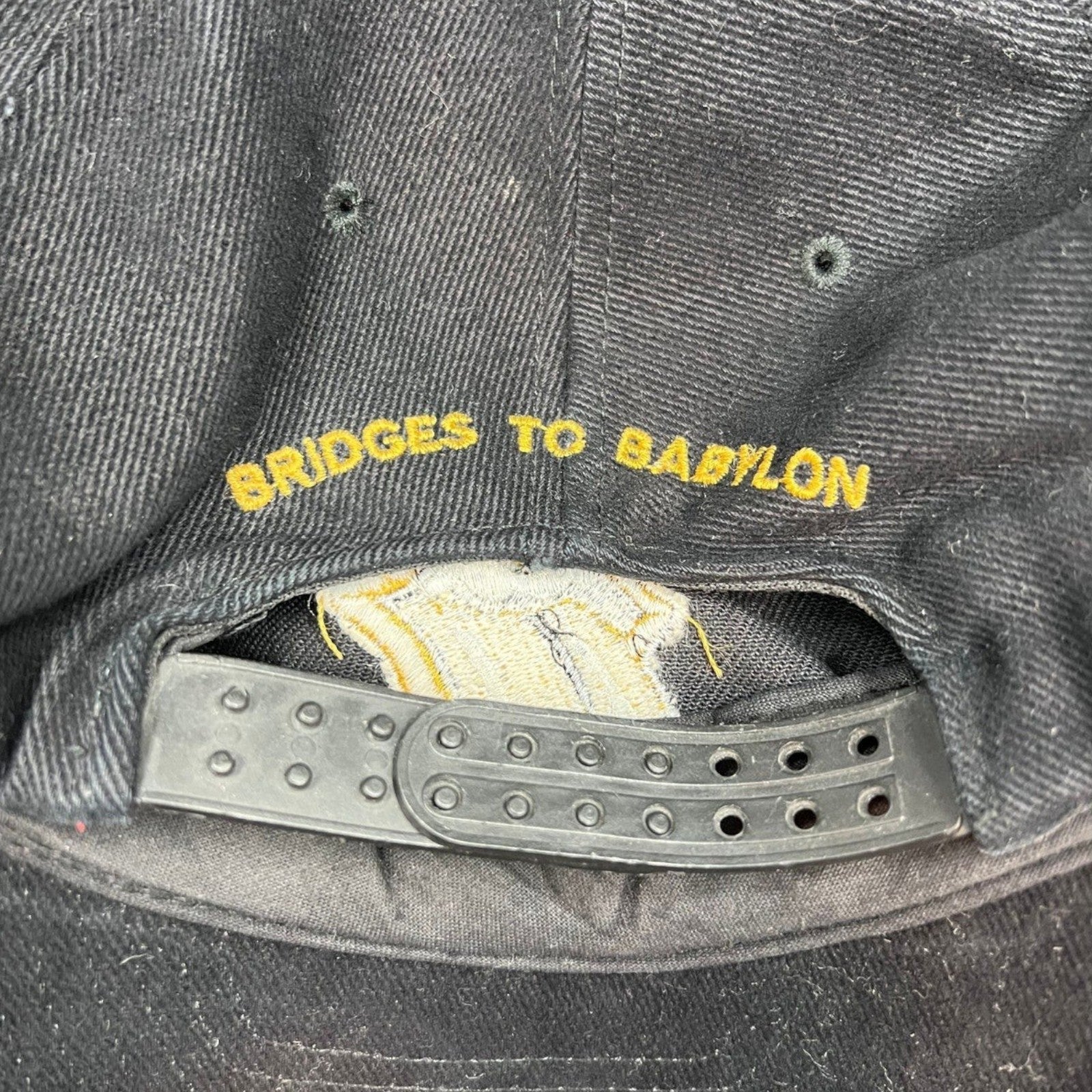Raree Finds vintage 1997 Rolling Stones Bridges to Babylon black cotton snapback hat with gold embroidered back text