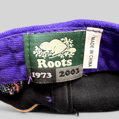 Raree Finds vintage 2003 Roots brand label inside a purple and black Crown Royal promotional hat