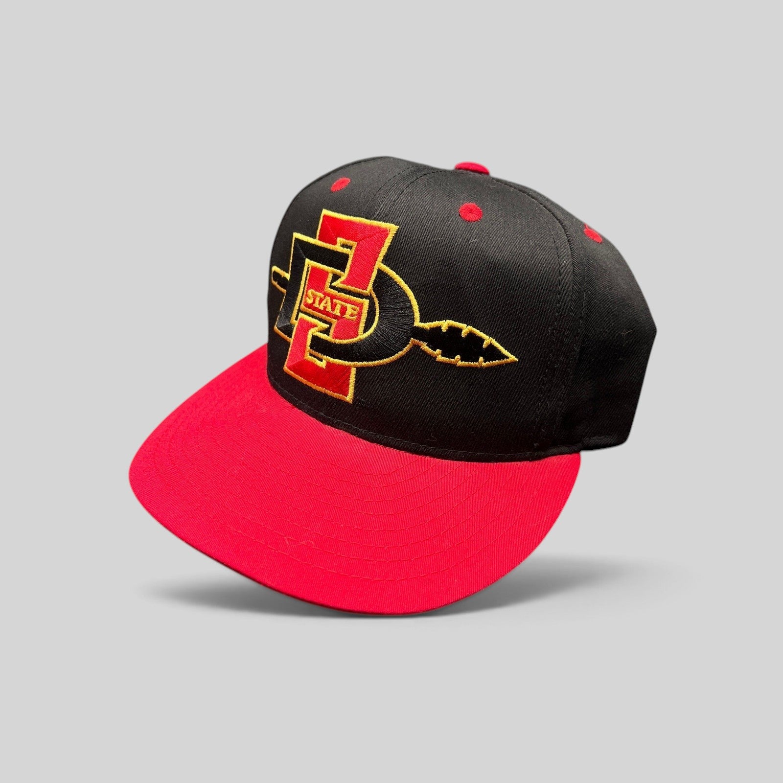Raree Finds vintage San Diego State Aztecs snapback hat in black and red cotton with embroidered SDSU spear logo.