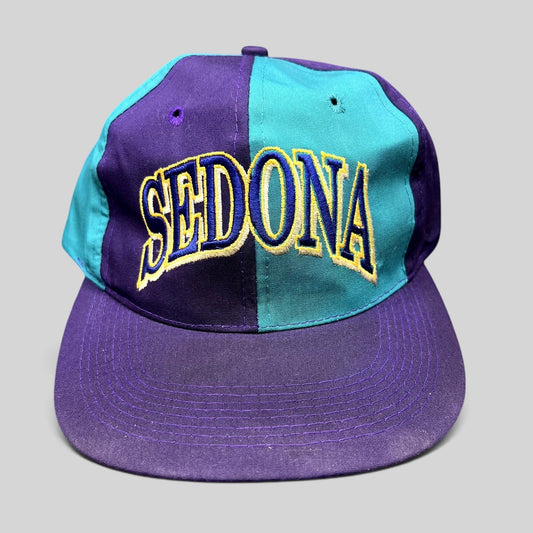 Raree Finds vintage Sedona Arizona snapback hat in purple and teal colorblock with embroidered script front