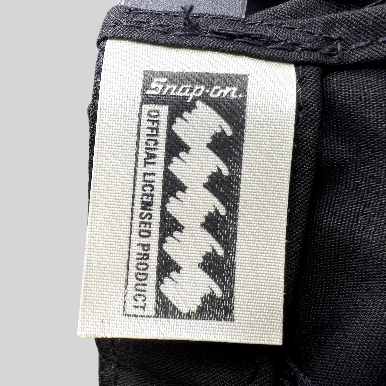 Raree Finds vintage Snap-on Tools official licensed product fabric tag sewn inside a black 90s snapback hat