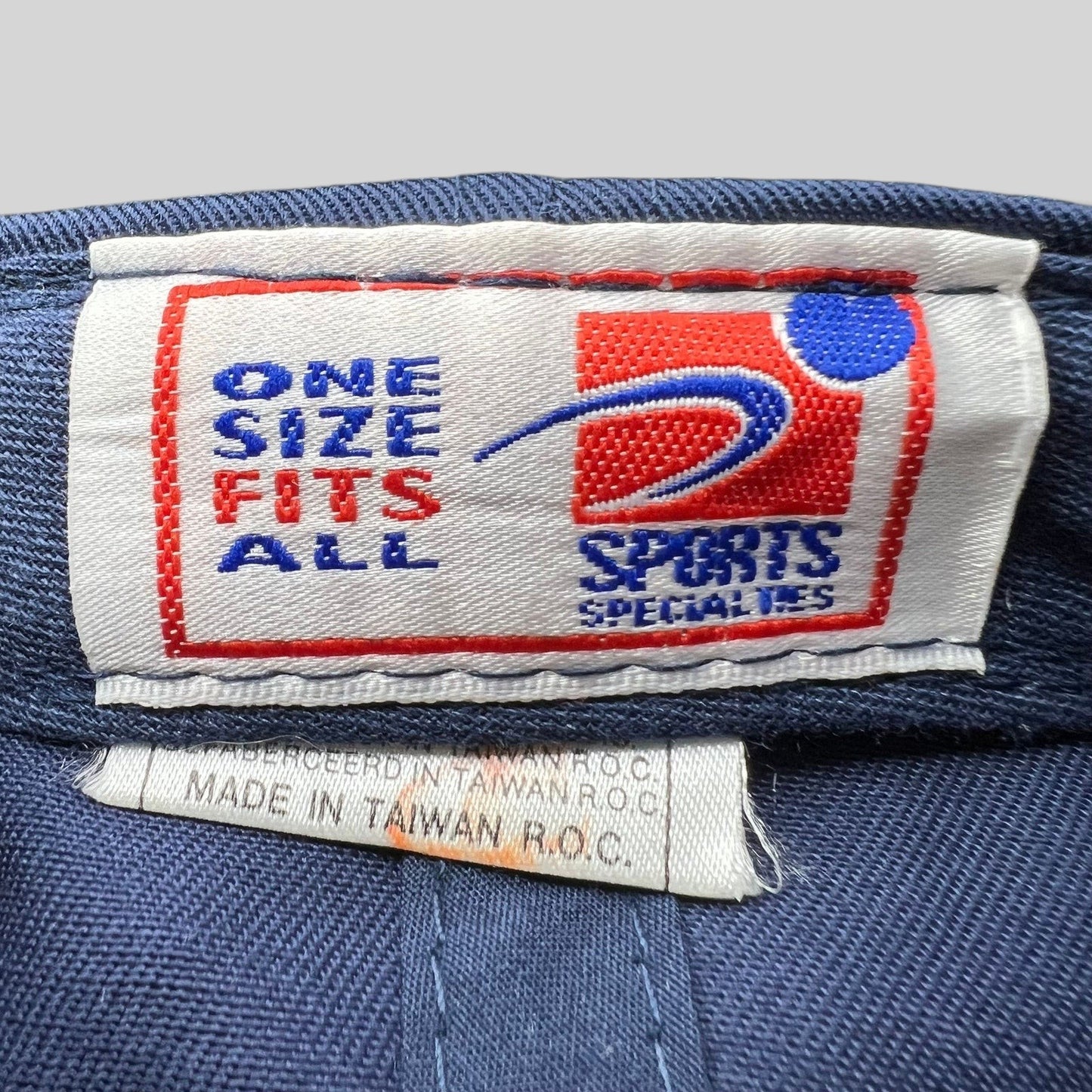 Raree Finds vintage Sports Specialties snapback hat interior label showing one size fits all and made in Taiwan
