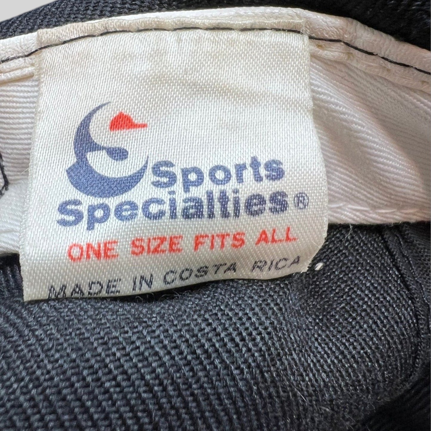 Raree Finds vintage Sports Specialties tag on a 90s Chicago Bulls snapback hat made in Costa Rica