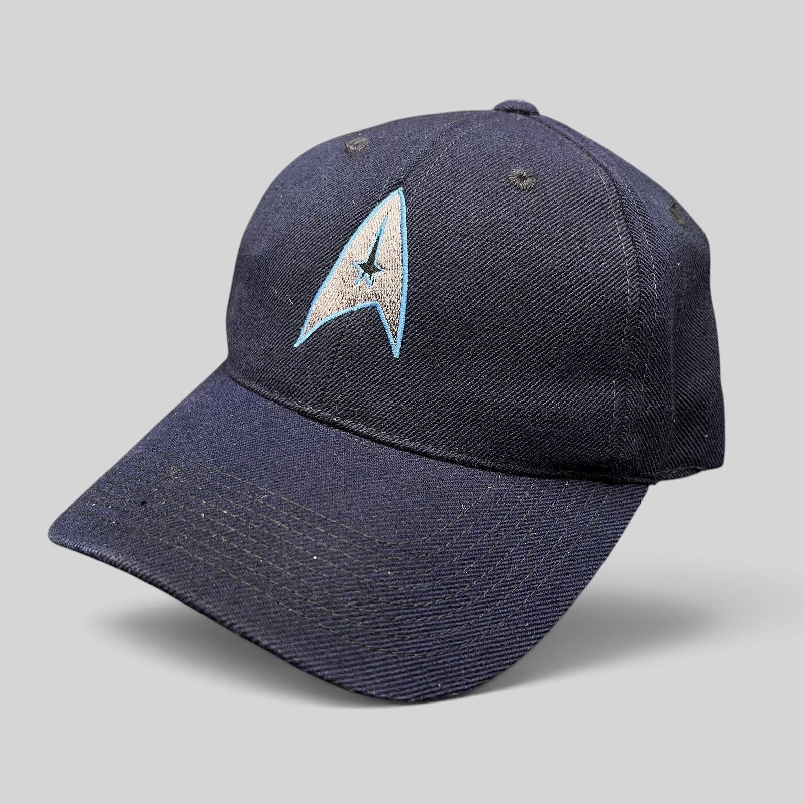 Raree Finds navy blue cotton twill Star Trek 2009 crew hat with embroidered Starfleet delta insignia on the front