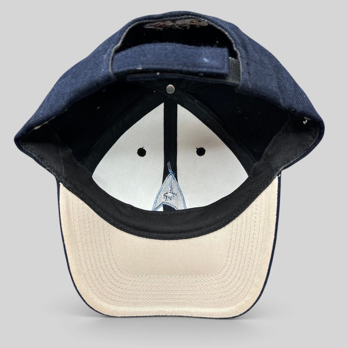 Raree Finds navy blue cotton twill Star Trek 2009 crew hat with Starfleet delta insignia and rear starship embroidery
