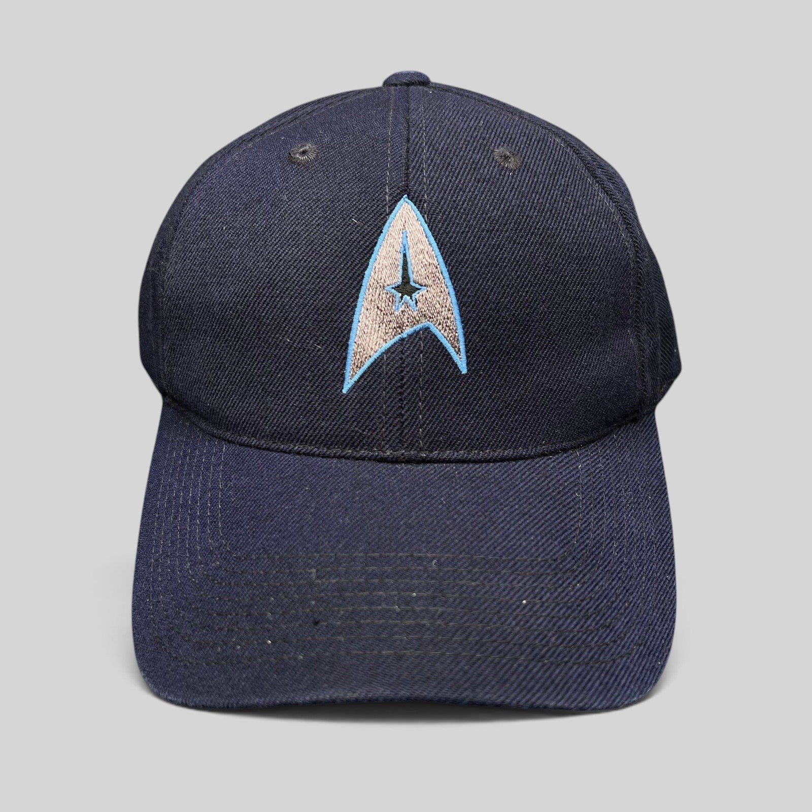 Raree Finds navy blue cotton twill Star Trek 2009 film crew strapback hat with embroidered Starfleet delta insignia