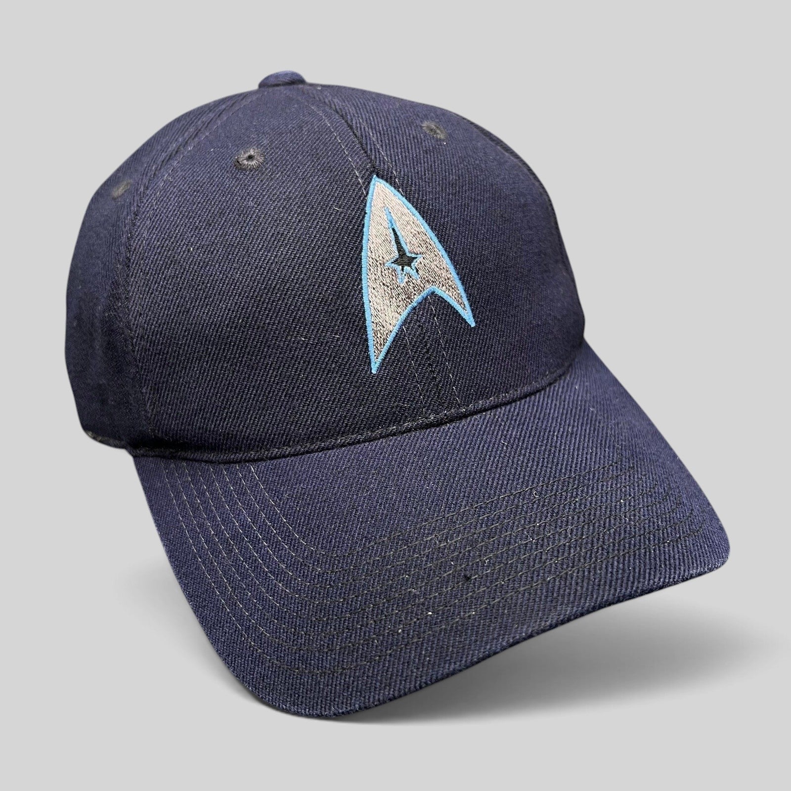 Raree Finds navy blue cotton twill Star Trek 2009 crew strapback hat with embroidered Starfleet delta insignia