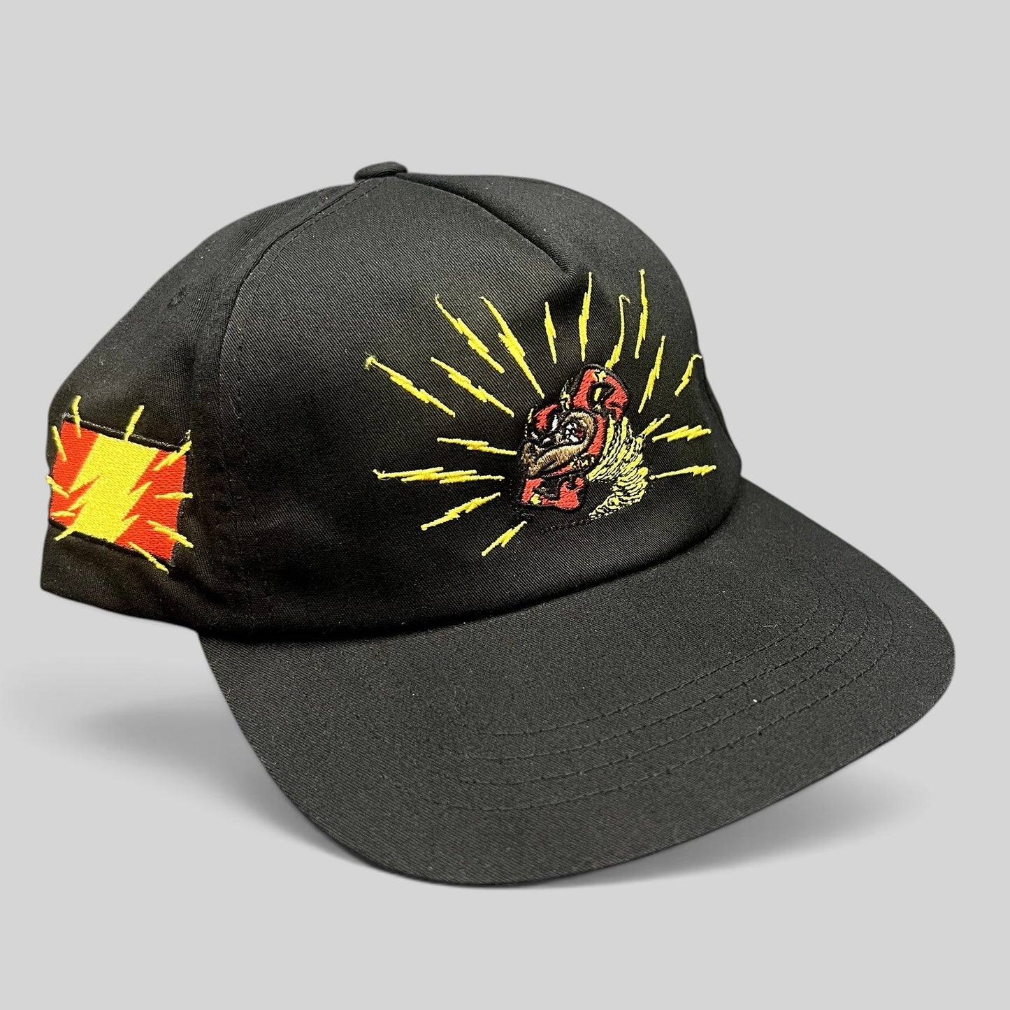 Raree Finds black snapback hat featuring embroidered Tasmanian Devil graphic and lightning details from The Hundreds.